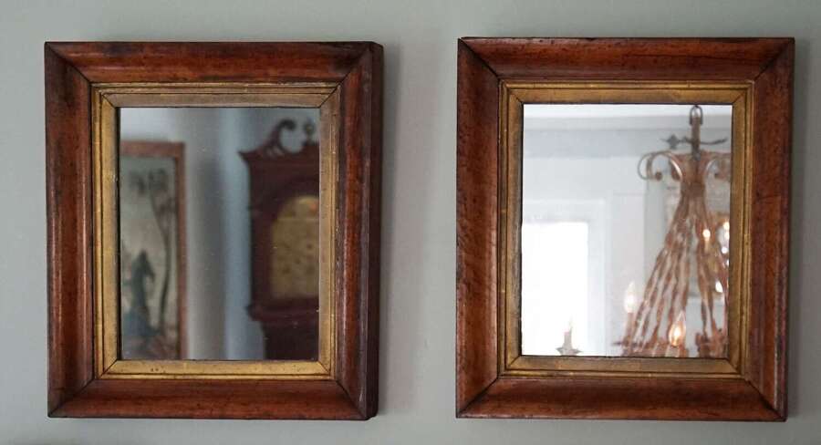 Pair of antique American framed walnut mirrors