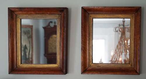 Pair of antique American framed walnut mirrors