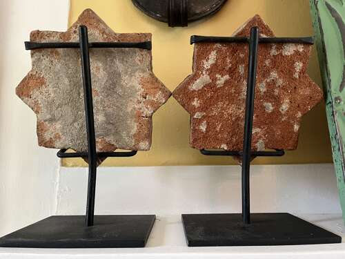 Pair of Antique Spanish Talavera Faience Star Tiles with Animal Motifs