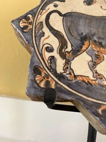 Pair of Antique Spanish Talavera Faience Star Tiles with Animal Motifs