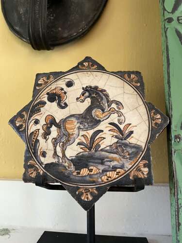 Pair of Antique Spanish Talavera Faience Star Tiles with Animal Motifs