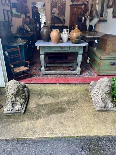 Pair of reconstituted limestone lions France, circa 1920.
