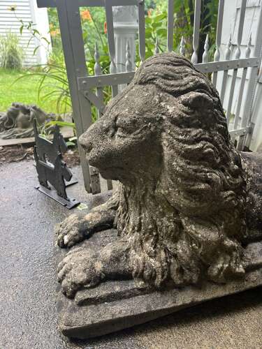 Pair of reconstituted limestone lions France, circa 1920.