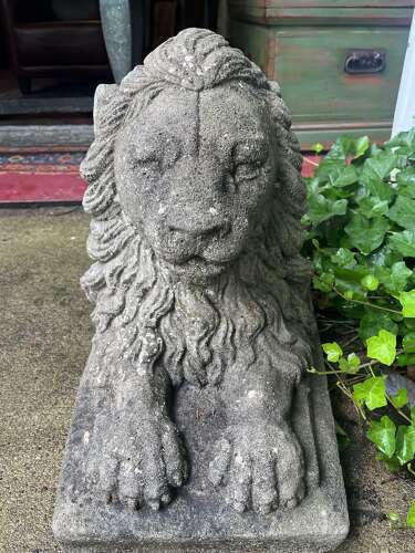 Pair of reconstituted limestone lions France, circa 1920.