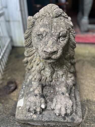 Pair of reconstituted limestone lions France, circa 1920.