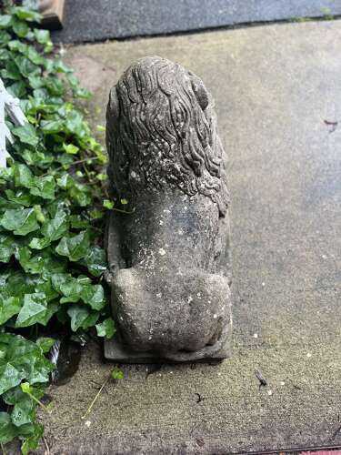 Pair of reconstituted limestone lions France, circa 1920.