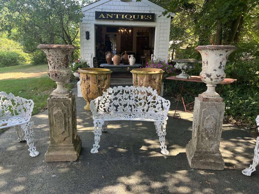 Pair of French cast iron white painted urns on base circa 1860