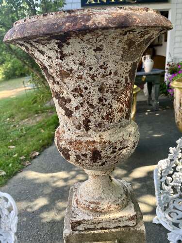 Pair of French cast iron white painted urns on base circa 1860