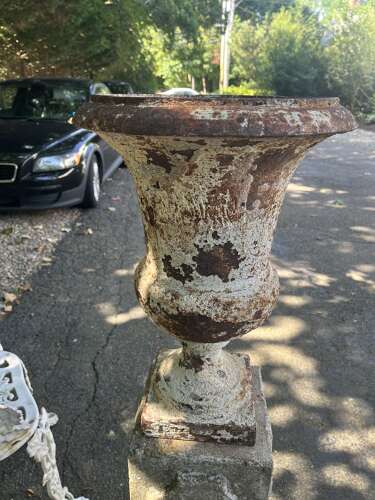 Pair of French cast iron white painted urns on base circa 1860