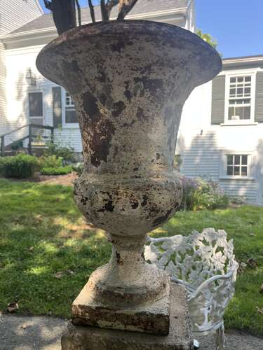 Pair of French cast iron white painted urns on base circa 1860
