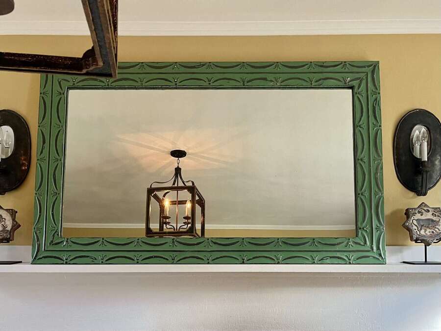 Pair of vintage green painted zinc mirror with embossed tin frame