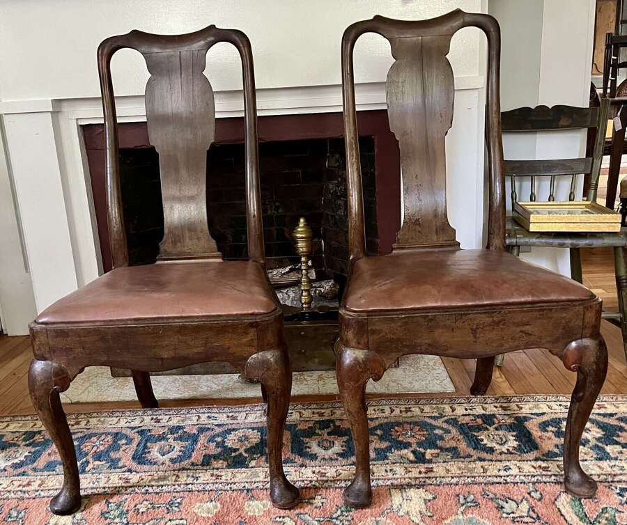 Pair of walnut Queen Anne style chairs with leather seats circa 1870