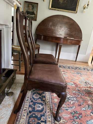 Pair of walnut Queen Anne style chairs with leather seats circa 1870