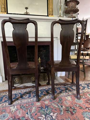 Pair of walnut Queen Anne style chairs with leather seats circa 1870