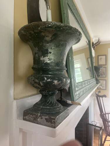 Pair of Antique cast iron urns with weathered green patina