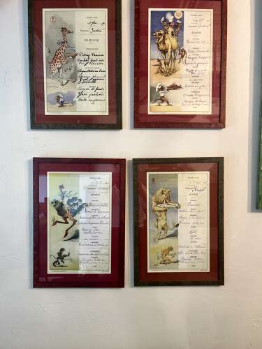 Set of four antique whimsical hand painted, framed French menus